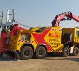 Fassi F820RA.2.28 crane with a truck tug