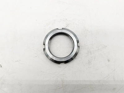 One-way flow regulator nut